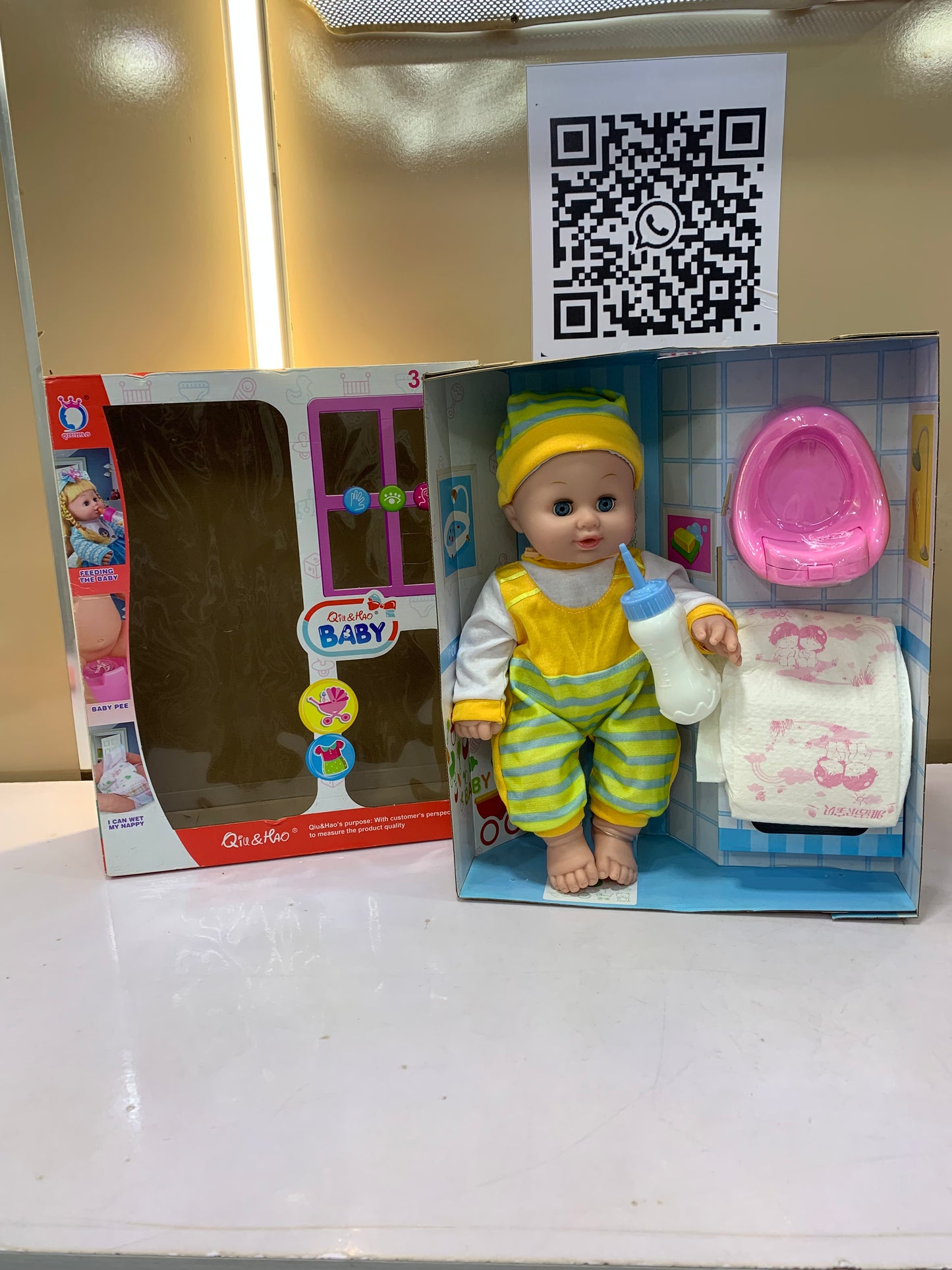 QIU & HAO BABY DOLL WITH DIAPER AND POTTY