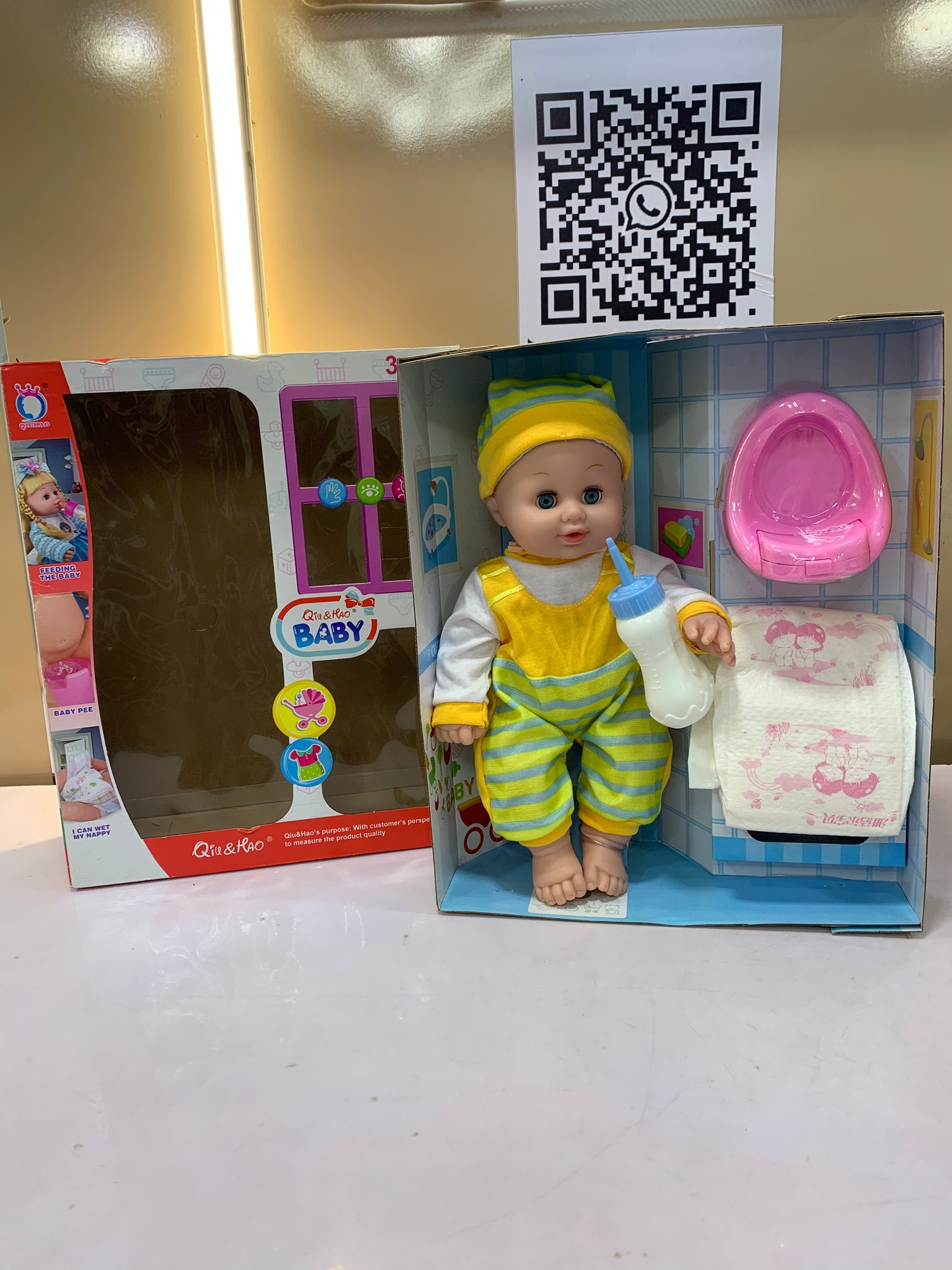 QIU & HAO BABY DOLL WITH DIAPER AND POTTY
